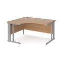 Dams Maestro 25 ergonomic desk with cable-managed leg in beech finish, shown from the left side.