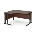 Dams Maestro 25 ergonomic desk with cable-managed leg in walnut finish, left-hand view showing spacious work surface and modern design.