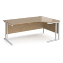 Dams Maestro 25 ergonomic desk with Kendal Oak finish and cantilever legs, showcasing a spacious workstation with modern design.