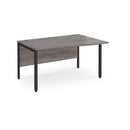 Dams Maestro 25 Wave desk with bench leg in grey oak finish, showing sleek modern design and wave-shaped desktop.