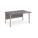 Dams Maestro 25 Wave desk with grey oak finish and bench leg, featuring a modern wave design and spacious workspace.