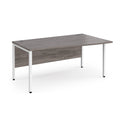 Dams Maestro 25 Wave desk with grey oak finish and bench leg design, featuring a modern, wave-shaped desk surface and sturdy construction.