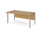 Dams Maestro 25 Wave Desk with Bench Leg in oak, featuring a stylish wave-shaped desk surface and sturdy bench leg design.