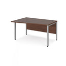 Dams Maestro 25 Wave Desk with Walnut finish and bench leg, left side view showing modern office workspace design