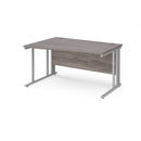 Dams Maestro 25 Wave Desk with cable-managed grey oak leg, featuring a stylish wave-shaped tabletop and modern design.