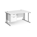White Dams Maestro 25 Wave Desk with cantilever leg and fixed 2-drawer pedestal, shown from the left side.