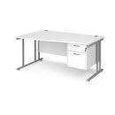 White Dams Maestro 25 Wave Desk with cantilever leg and fixed 2-drawer pedestal, shown from the left side.