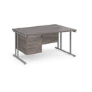 Dams Maestro 25 Wave desk with grey oak finish, cantilever leg, and fixed 3-drawer pedestal in a modern office setting.