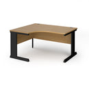 Dams Vivo ergonomic oak desk with sleek wood finish, spacious surface, and modern design for ergonomic workspace setup.
