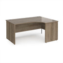 Dams Maestro 25 ergonomic desk with panel end leg in Nebraska Oak finish, featuring a spacious work surface and modern design.