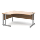 Dams Momento ergonomic desk with cantilever leg in beech wood, 1400mm length, shown from the left side.