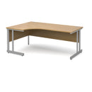 Dams Momento ergonomic oak desk with cantilever leg, featuring a spacious work surface and modern design for office use.