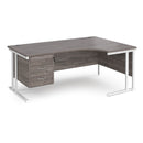 Dams Maestro 25 ergonomic desk with grey oak finish, cantilever leg, and fixed 3-drawer pedestal, shown from the left side.