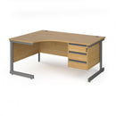 Dams Contract 25 ergonomic oak desk with cantilever legs and three-drawer pedestal, showing sleek modern office workspace design.