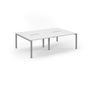 White Connex scalloped double back-to-back desks by Dams, showcasing modern office workspace with sleek design and sturdy construction.