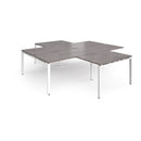 Dams Adapt Back to Back 4 Desk Cluster with Returns in Grey Oak finish, featuring modern workspace design with multiple workstations.