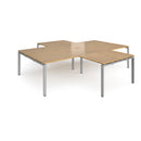 Dams Adapt Back to Back 4 Desk Cluster with Oak finishes and returns, featuring a modern office workspace setup.