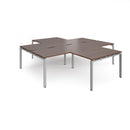 Dams Adapt Back to Back 4 Desk Cluster with Walnut finish and returns, showing a modern office workspace setup.