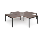 Dams Adapt Back to Back 4 Desk Cluster with Returns in Walnut wood, featuring modern workspace setup with desks and returns.