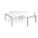 White Adapt Back-to-Back 4 Desk Cluster with Returns by Dams, showing the sleek office workspace setup with multiple desks and returns.