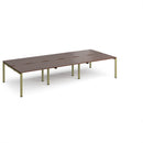 Dams Adapt Triple Back to Back Desks in walnut finish, 800mm deep with sleek, modern design and spacious work surfaces.