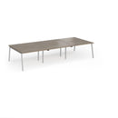 Dams Connex Plus Angled Triple Back To Back Desk in Nebraska Oak wood with sleek modern design and spacious workspace.