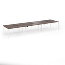 Dams Connex Plus Slimline Goal-Post Triple Back to Back Desk in walnut wood finish, showing sleek modern office workspace design.