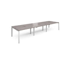 Dams Adapt Triple Back to Back Desks in grey oak finish, 600mm deep, showing sleek modern workspace with spacious desks.