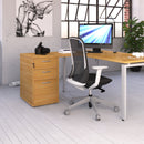 Dams oak desk high 3-drawer pedestal with 600mm depth and 800mm flyover top, shown in a modern office setting.
