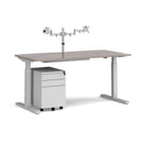 Dams Elev8 Mono sit-stand desk bundle with double monitor arm, steel pedestal, and cable tray on a workspace.