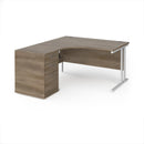 Dams Maestro 25 ergonomic desk with matching high pedestal in a modern office setting, showing the clean, spacious workspace layout.