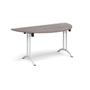 Grey oak semi-circular folding leg table with curved foot rails by Dams, showcasing its sturdy design and smooth folding mechanism.