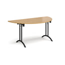 Semi circular folding leg table with curved oak foot rails by Dams, showcasing its smooth surface and sturdy construction.