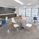 Dams Pisa circular dining table with grey oak surface and round chrome base, showcasing modern design and smooth finish.