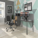 Dams Tikal straight desk with hairpin metal legs and a central support pedestal on a modern office floor.