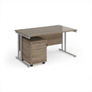 Dams Maestro 25 straight desk with a two-drawer under desk pedestal, showing the clean wood finish and functional storage.