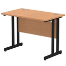 Dynamic Impulse 600mm deep straight desk with oak finish and cantilever legs, showcasing a modern office workspace.