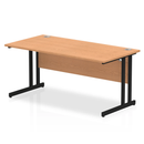Dynamic Impulse 800mm deep straight desk with cantilever legs in oak wood, showcasing a spacious office workspace.