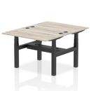 Dynamic Air 2 Person Back-to-Back Height Adjustable Desk Bench in grey oak with cushioned seating and sturdy frame.