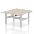 Dynamic Air 2 Person Back-to-Back Height Adjustable Bench in grey oak wood finish, suitable for office or home workspace.