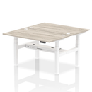 Dynamic Air 2-person back-to-back height adjustable bench in grey oak with padded seats and sturdy metal frame.