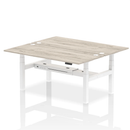Dynamic Air 2-person back-to-back height adjustable bench in grey oak with padded seats and sturdy metal frame.