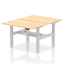 Dynamic Air 2 Person Back-to-Back Height Adjustable Maple Bench Desk with padded seats and sturdy frame.
