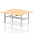 Dynamic Air 2 Person Back-to-Back Height Adjustable Bench Desk in Maple wood, showing the sturdy, ergonomic design and adjustable features.