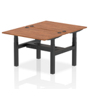 Dynamic Air 2-person back-to-back height adjustable bench desk in walnut wood, suitable for fitness or workspace use.