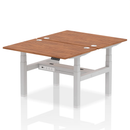 Dynamic Air 2-person back-to-back height adjustable bench desk in walnut wood finish, suitable for workout or office use.
