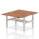 Dynamic Air 2 Person Back-to-Back Height Adjustable Walnut Desk Bench showing the sturdy wooden surface and adjustable metal frame.