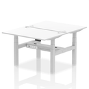 White Air 2-person back-to-back height adjustable bench desk by Dynamic, showing the sturdy, sleek design and adjustable features.