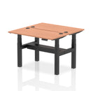 Dynamic Air 2-person back-to-back slimline height adjustable bench desk with beech wood finish, ideal for office or workspace.