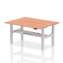 Dynamic Air 2 Person Back-to-Back Slimline Height Adjustable Beech Desk Bench showing the modern, ergonomic design and wooden finish.